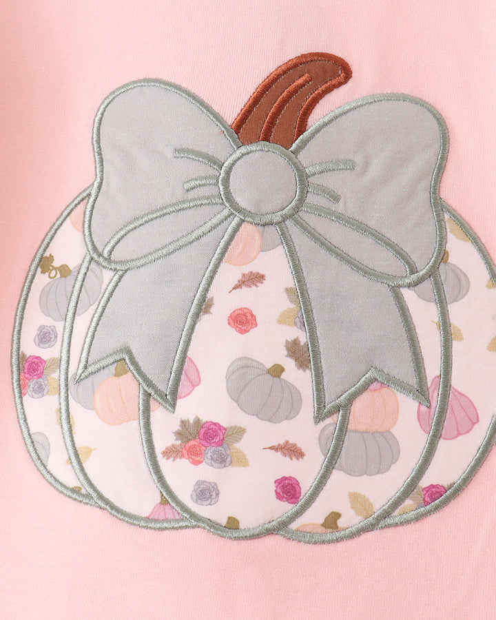 Pink pants set with pumpkin appliqué and large bow detail