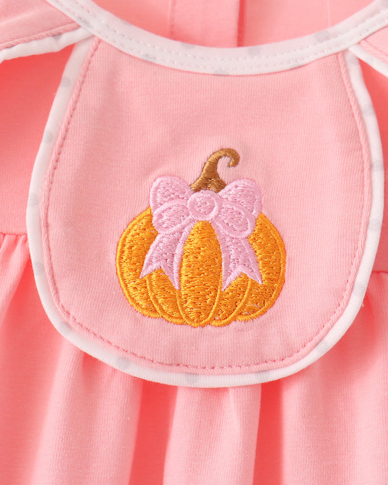 Pink sleeveless dress bib with pumpkin applique embroidery