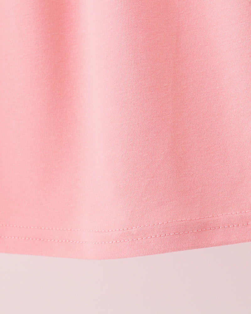 Pink sleeveless dress hem with double-stitched edge
