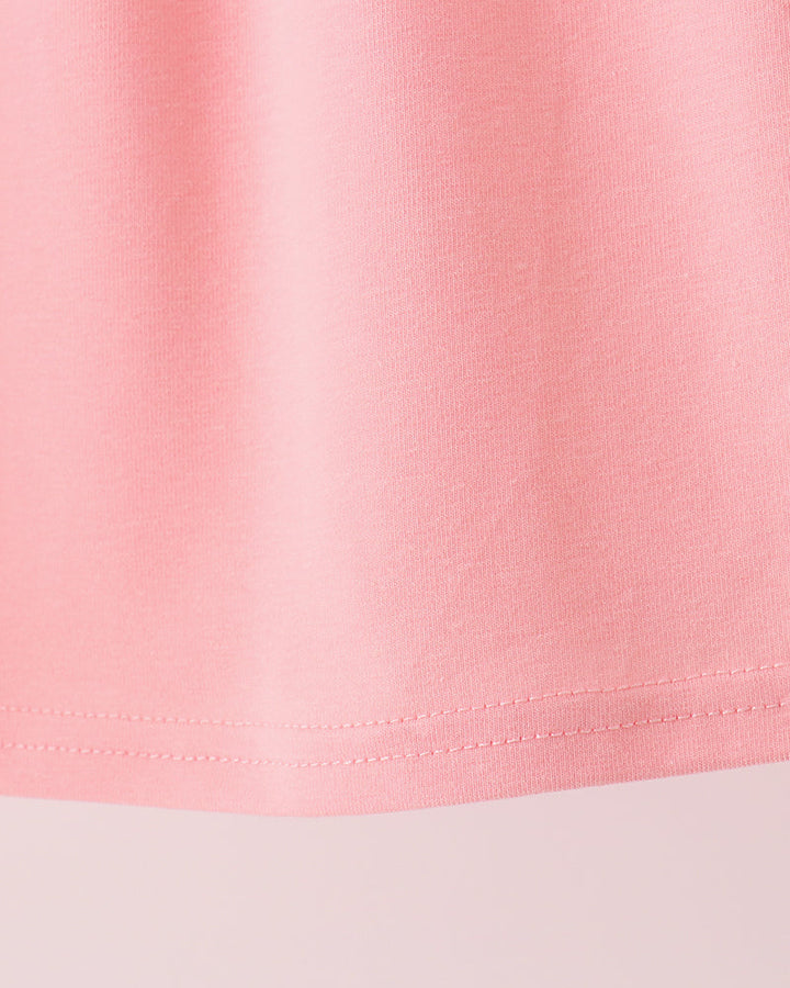 Pink sleeveless dress hem with double-stitched edge