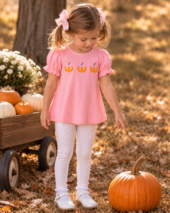 Toddler girl is wearing a Pink Pumpkin Embroidered Pants Set
