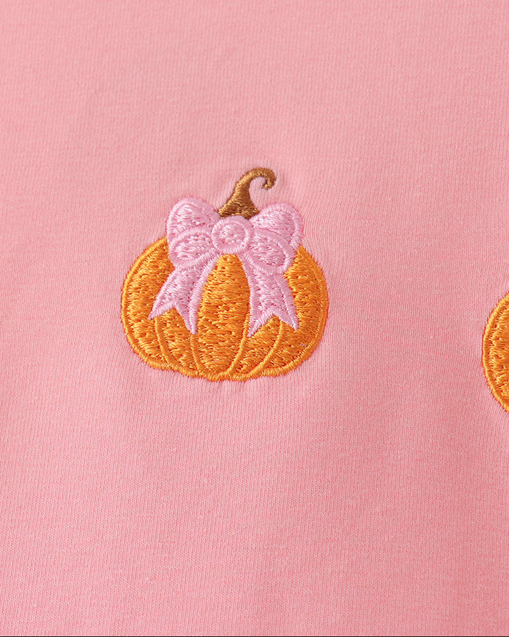 Pink shirt with multicolor pumpkin embroidery applique