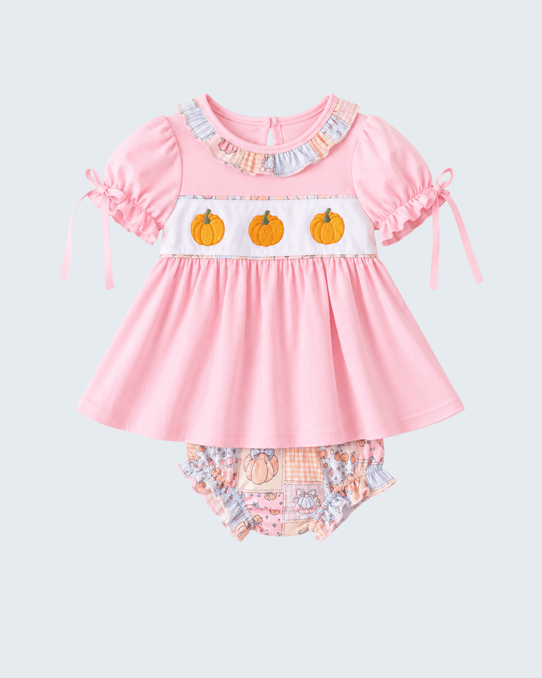 Pink puff-sleeve dress with ruffle collar, pumpkin embroidery, and matching bloomers
