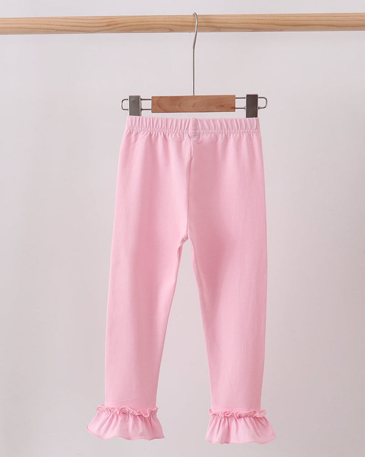 Pink ankle leggings with ruffled cuffs and elastic waistband