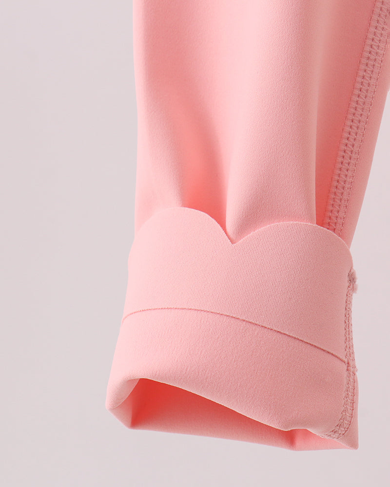 Close-up of a pink garment on a light gray background