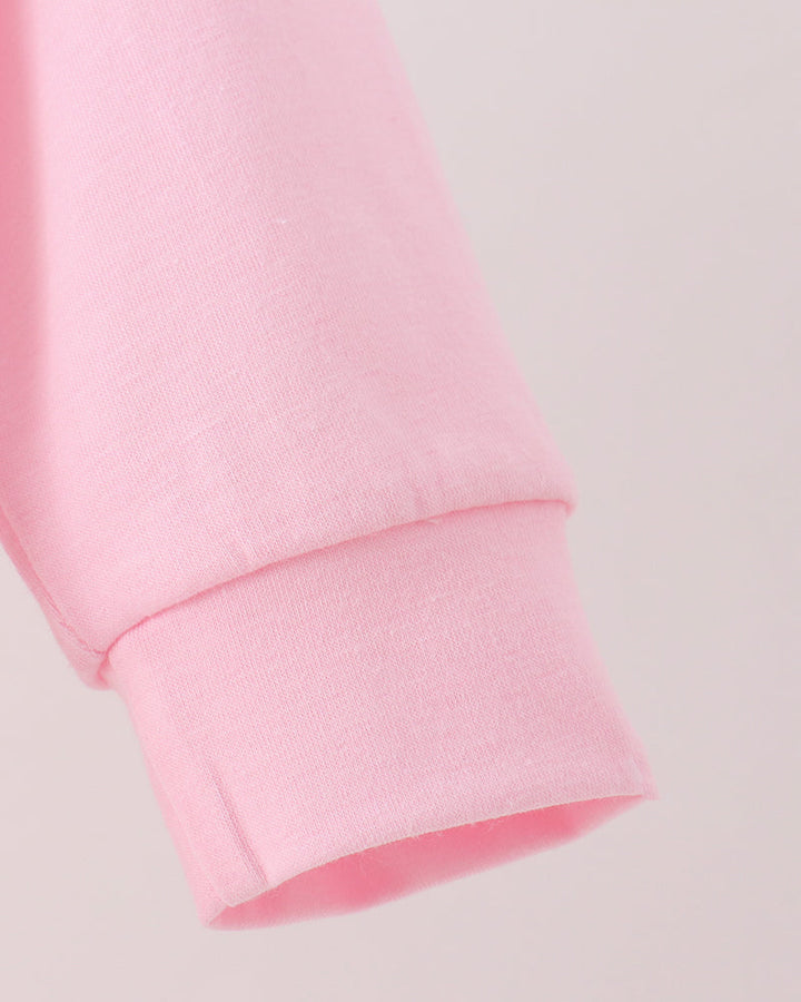 Pink bubble romper sleeve with ribbed cuff and gathered hem