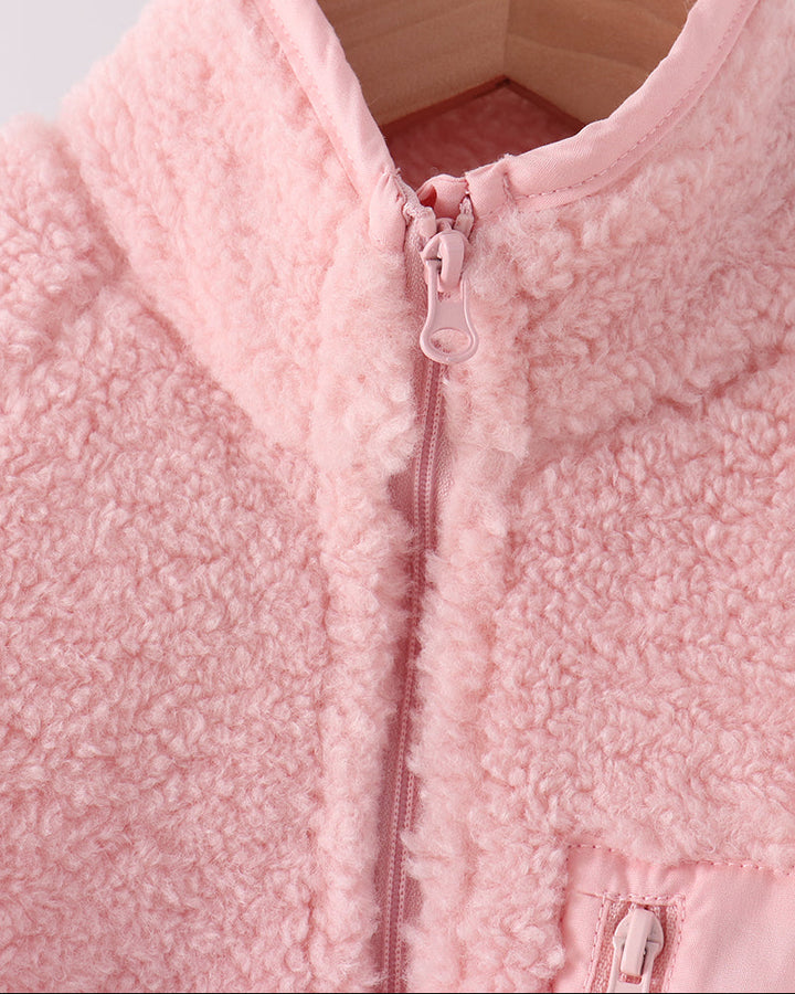 Pink fleece jacket with stand collar and front zipper, close-up