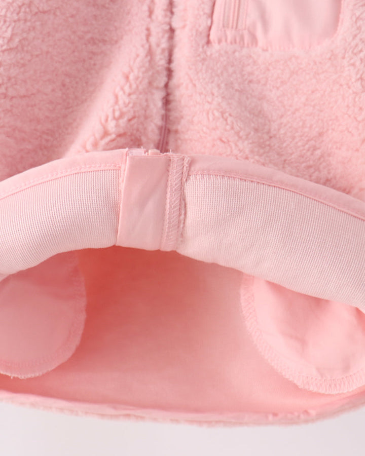 Pink fleece jacket hem with elastic waistband and inner seam