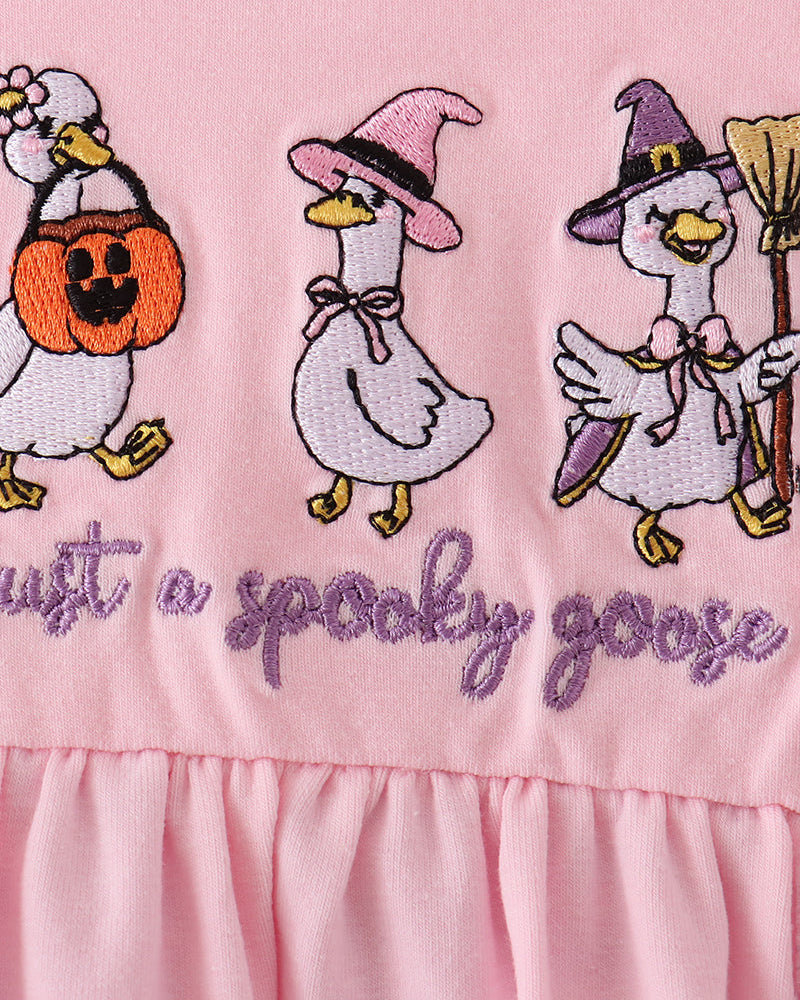 Pink top with stitched geese and cursive "Happy Easter" text
