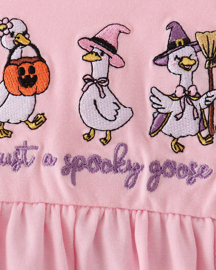 Pink top with stitched geese and cursive "Happy Easter" text