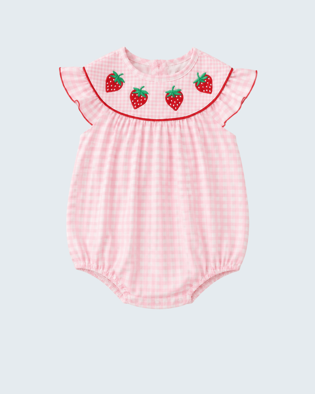 Pink checkered baby romper with strawberry embroidery on a light gray background