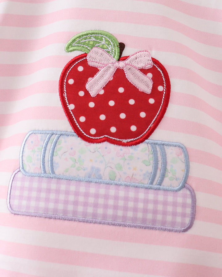 Apple and books applique on pink striped fabric