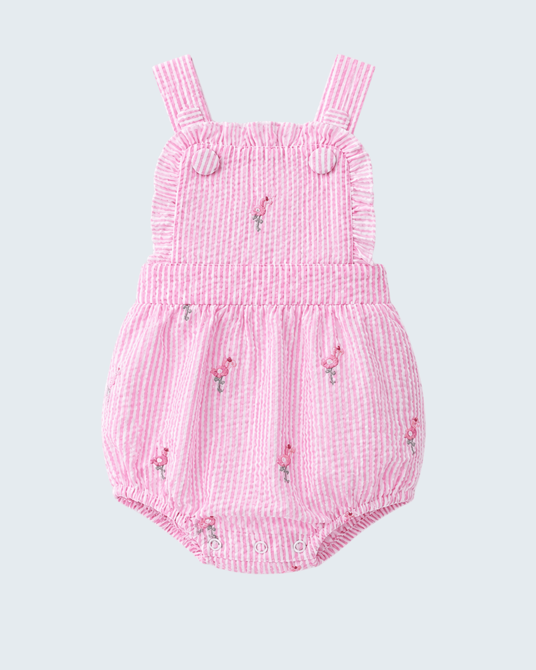 Pink checkered baby romper with embroidered details on a light gray background