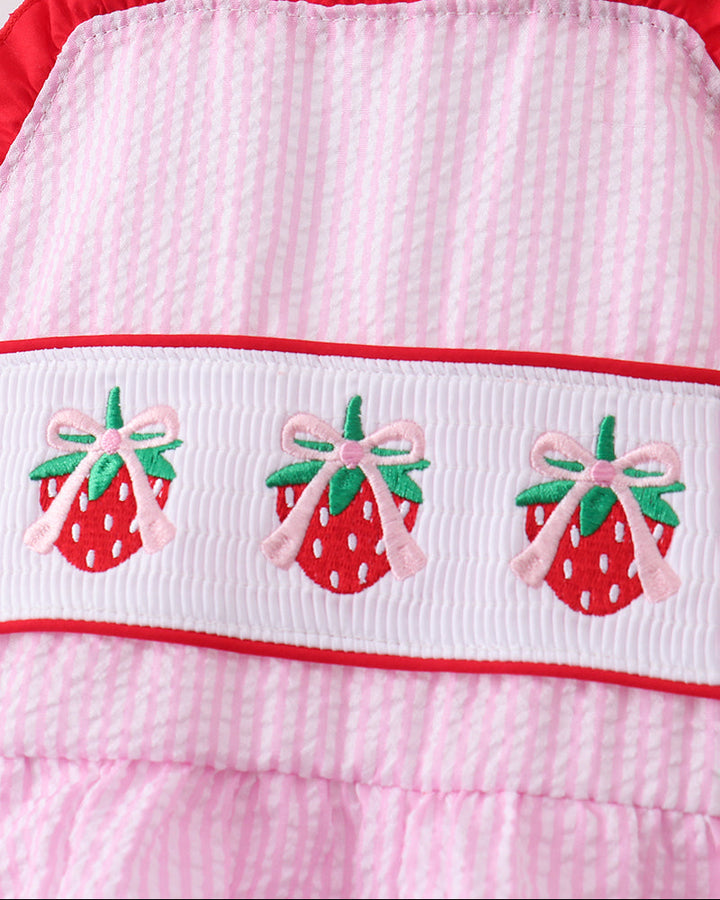 pink and red girls swimsuit with strawberries