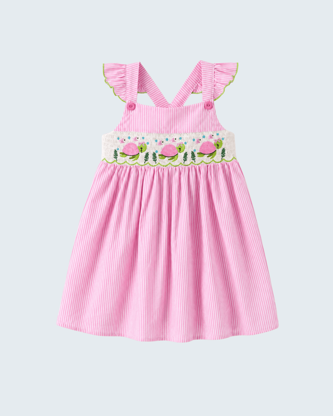Pink dress with floral embroidery on a light gray background