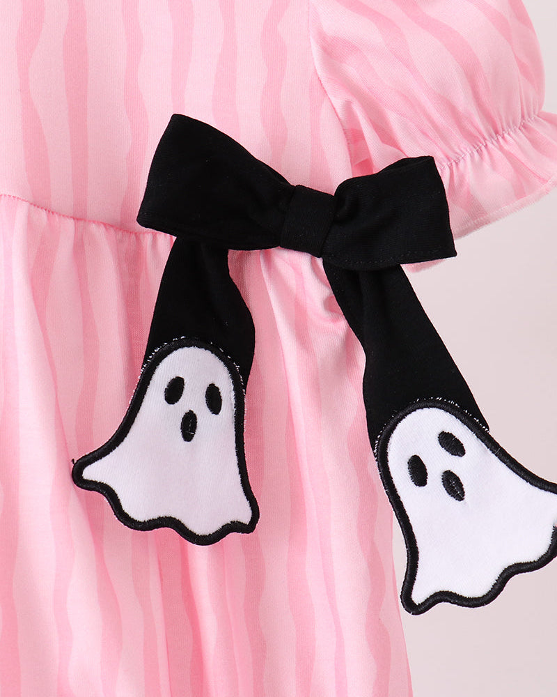 Close view of ghost appliques with black ribbon bow on pink striped romper