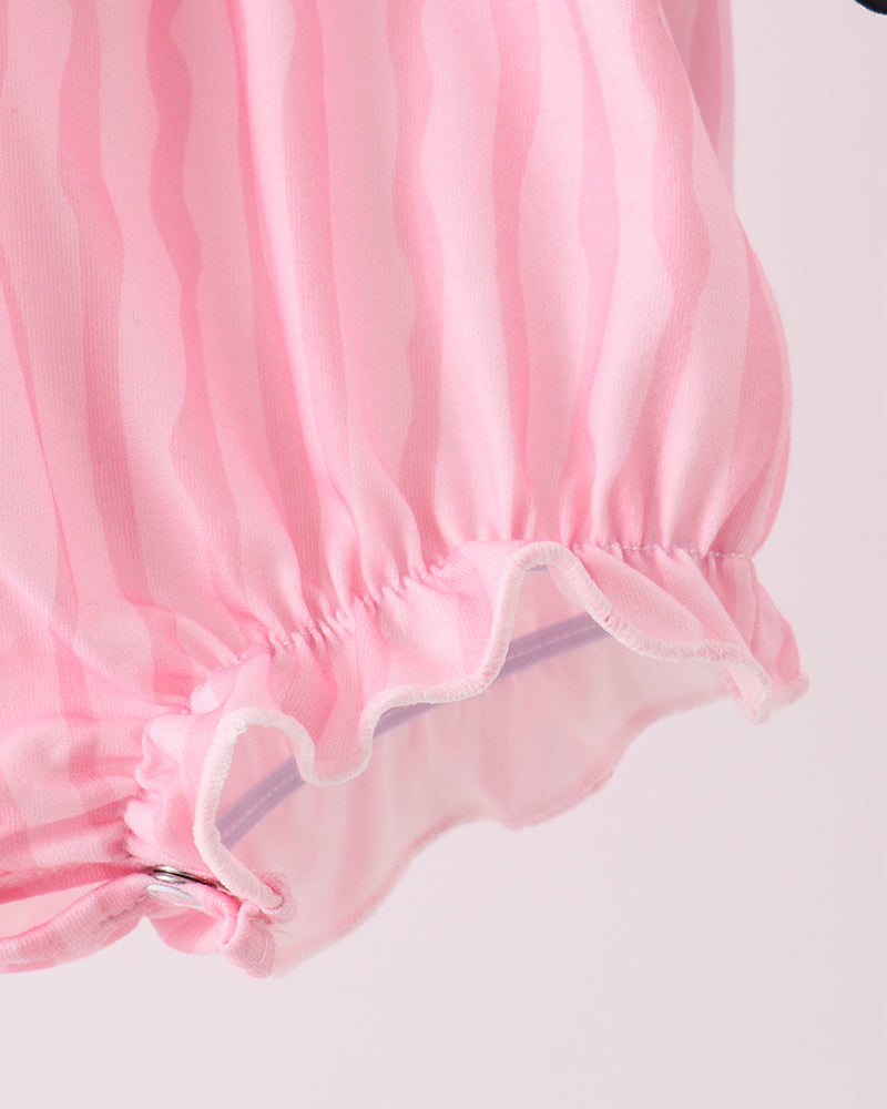 Pink striped bubble romper leg opening with ruffled hem and gathered cuffs