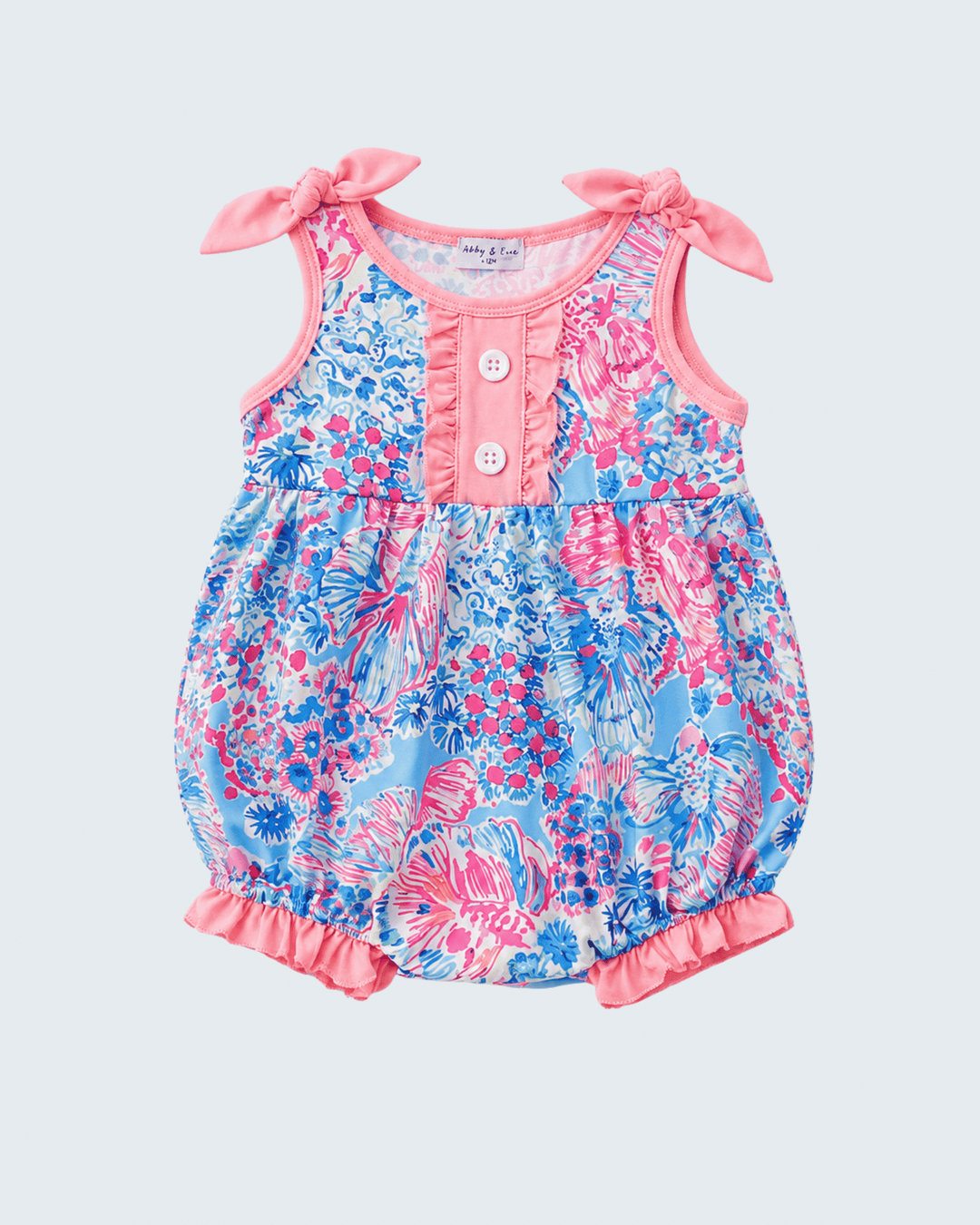 Floral baby romper with pink accents on a light gray background