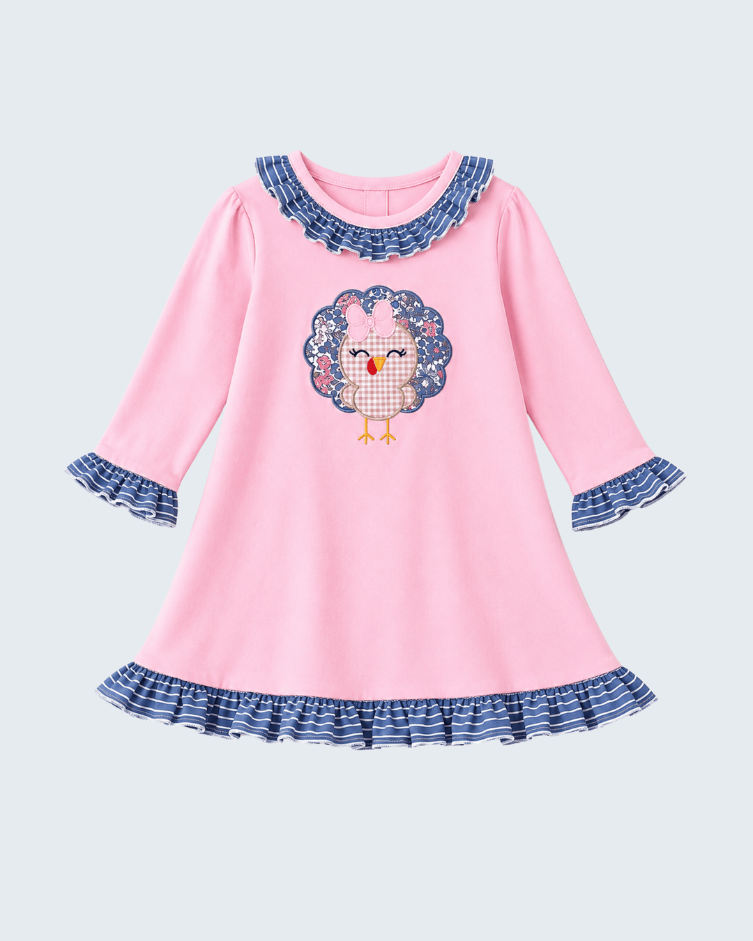 Pink dress with turkey appliqué, ruffle collar, cuffs, and hem