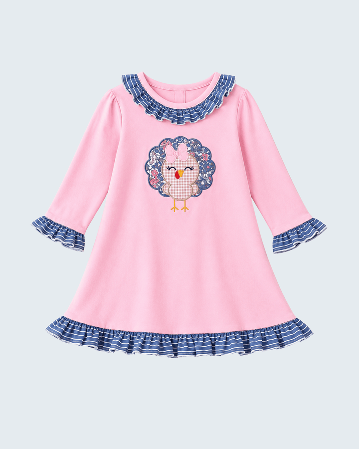 Pink dress with turkey appliqué, ruffle collar, cuffs, and hem