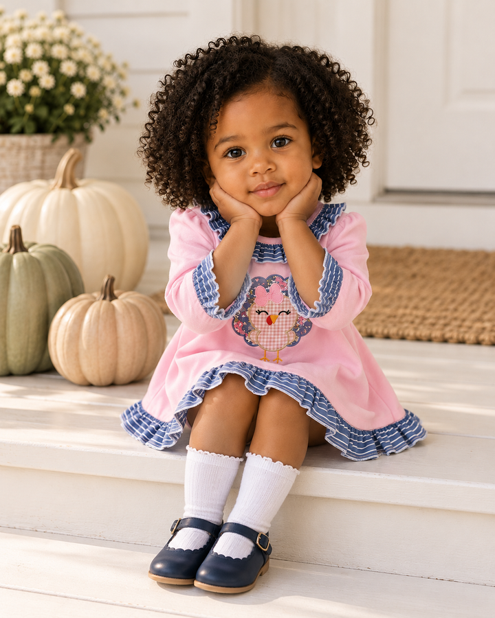 Pink turkey appliqué ruffle dress with blue trim on toddler girl