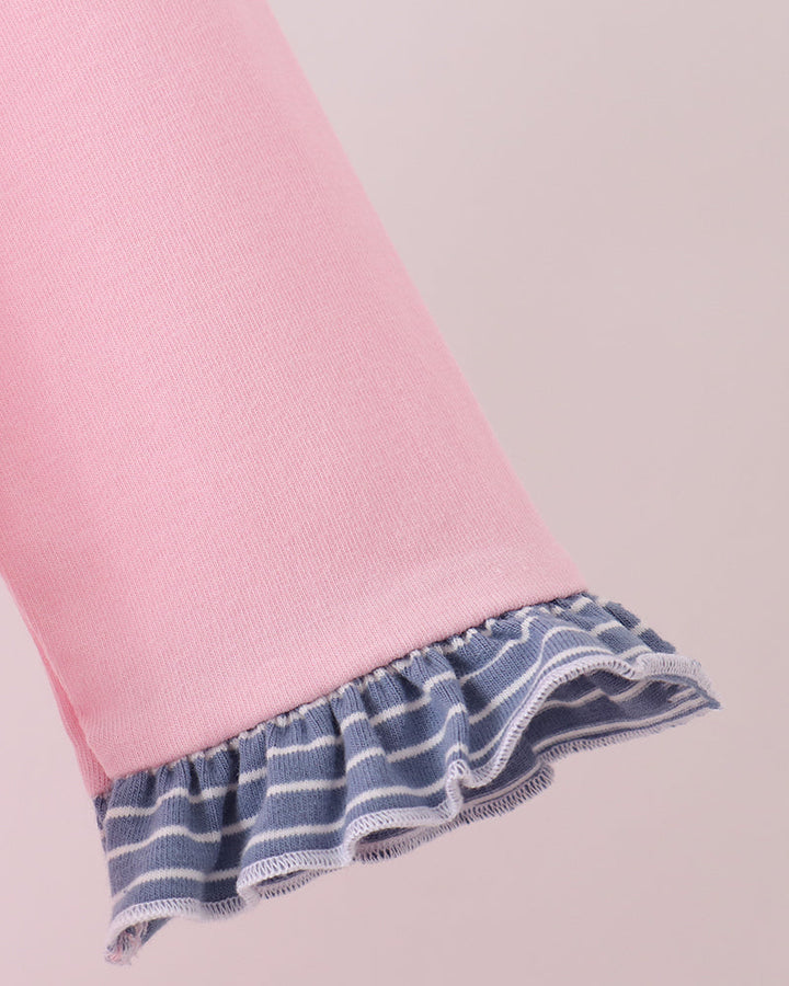 Pink sleeve with blue striped ruffle cuff trim