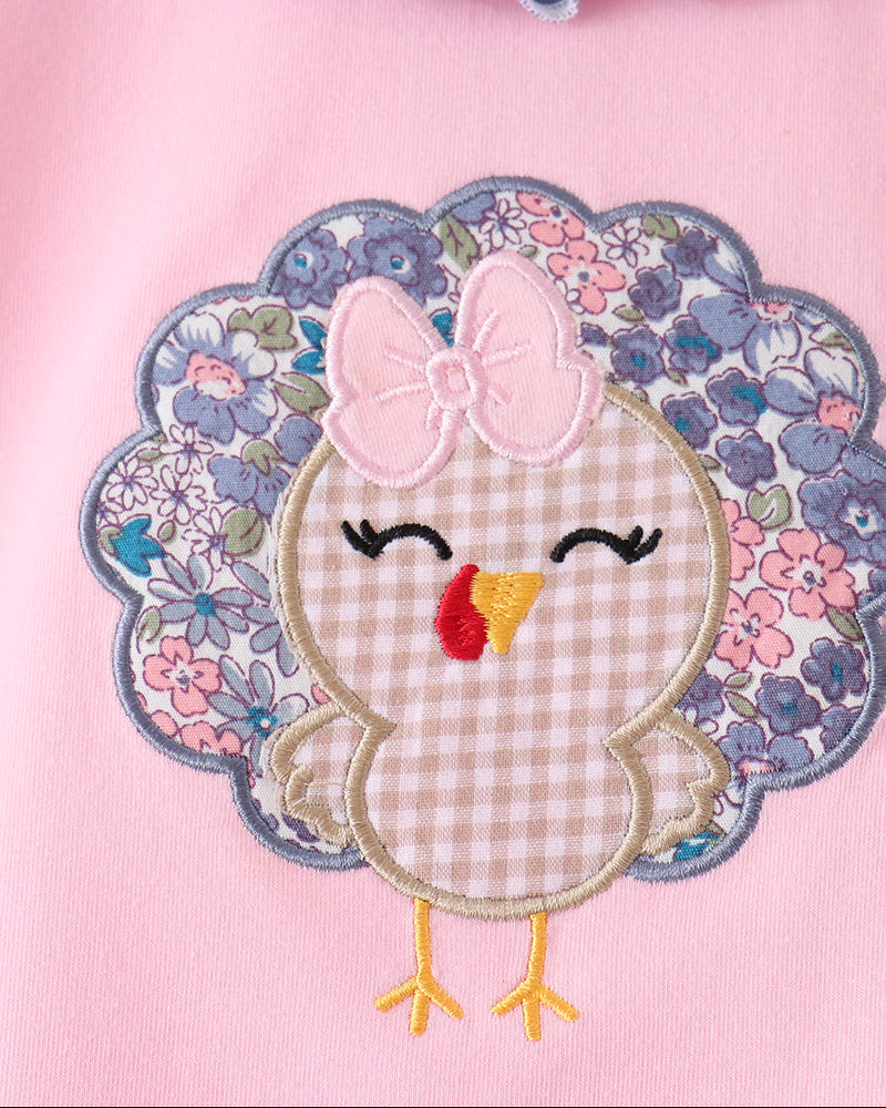Pink pants set with floral turkey appliqué and bow detail