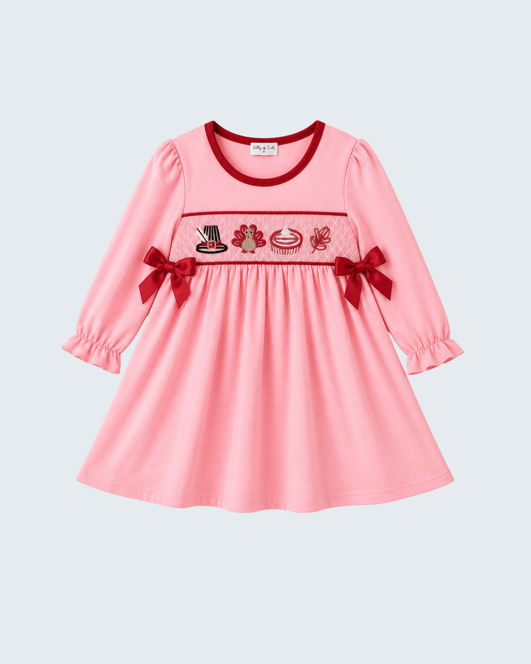 Pink embroidered Thanksgiving dress with long sleeves, bow details, and turkey graphic
