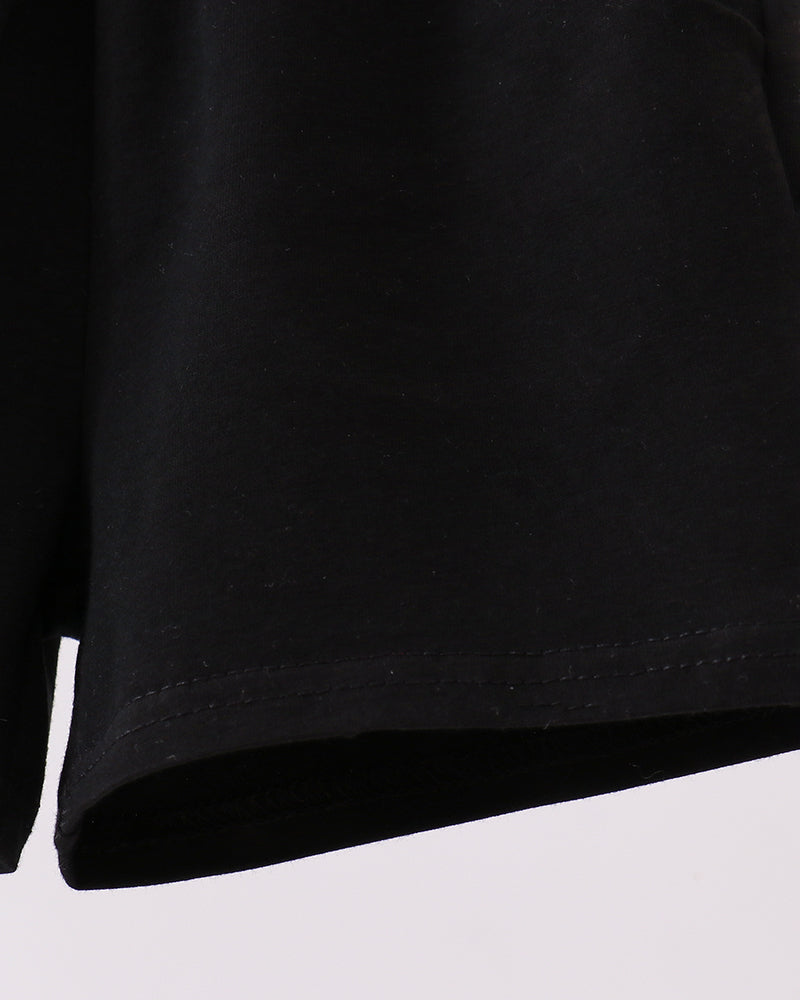 Black shorts with stitched hem and visible inner seam.