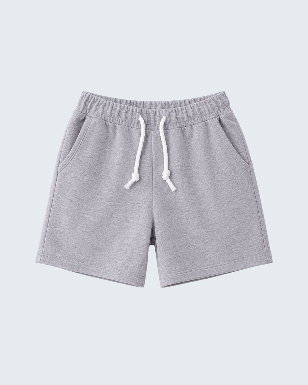 Grey drawstring shorts with elastic waistband and white drawcord ties