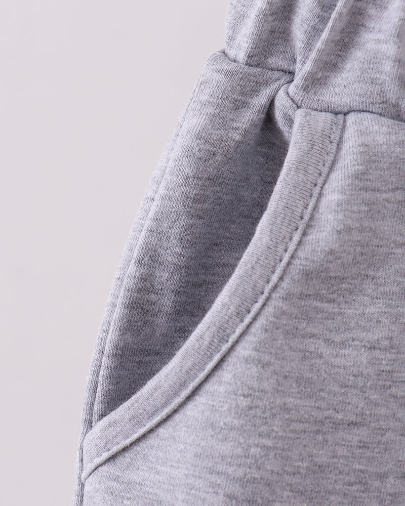 Grey shorts with side seam and curved hem detail