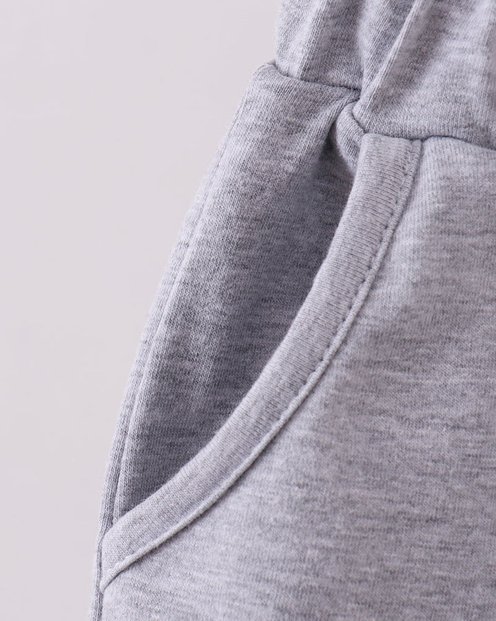 Grey shorts with side seam and curved hem detail