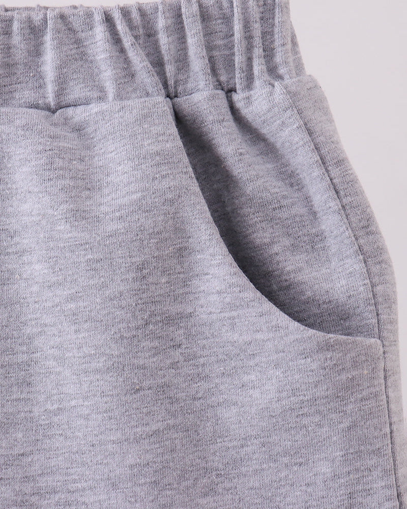 Heather grey shorts with side seam detail and curved pocket opening