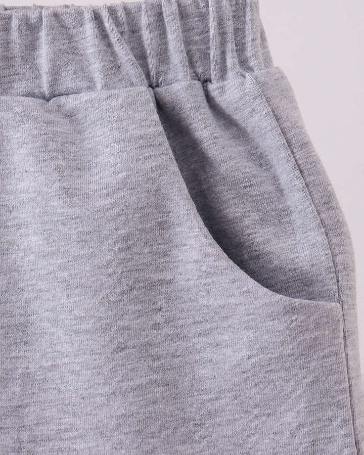 Heather grey shorts with side seam detail and curved pocket opening