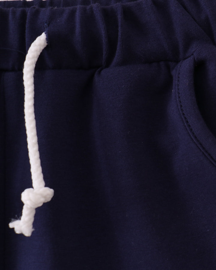 Navy shorts with side pocket and white drawstring