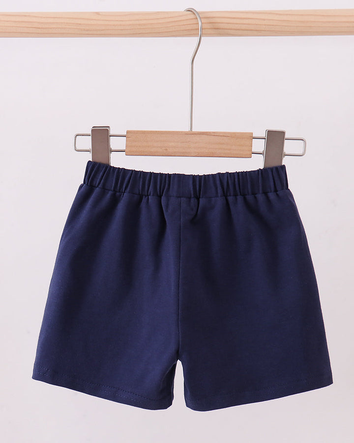 Navy shorts on hanger with elastic waistband and front seam