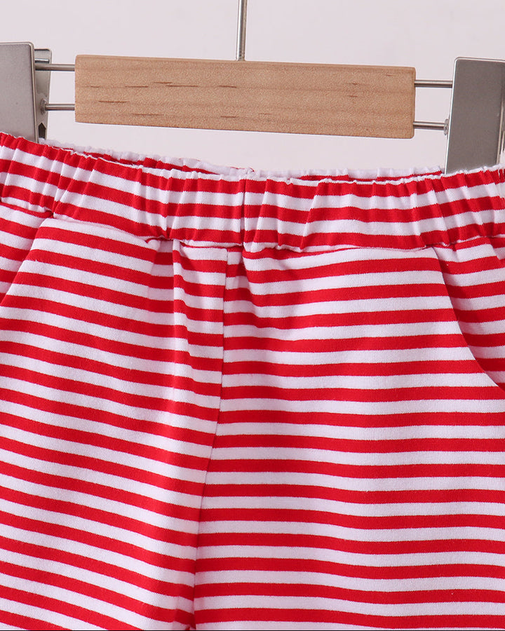 Red and white striped shorts on hangar with elastic waist and pleated front