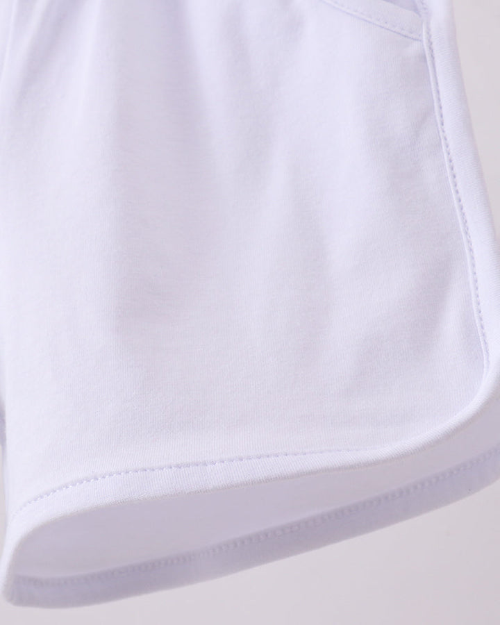 White shorts hem with curved pocket opening and double-stitch edge