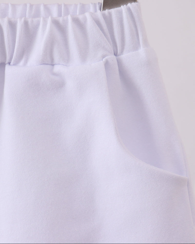 White shorts with elastic waistband and stitched front pleats