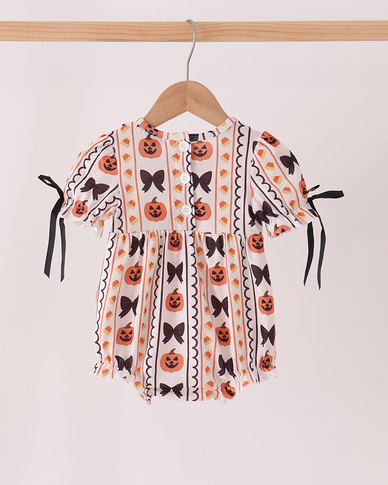White Halloween bubble romper with pumpkin embroidery, black ruffle collar, fringe sleeves and bows