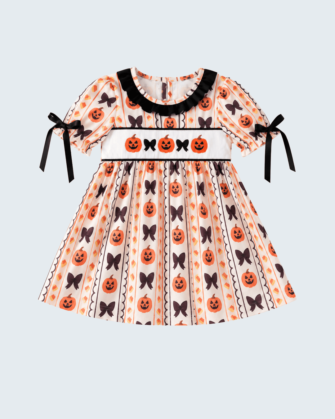 Embroidered ruffle dress with pumpkin and heart prints, black trim, short puff sleeves