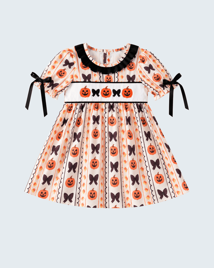 Embroidered ruffle dress with pumpkin and heart prints, black trim, short puff sleeves