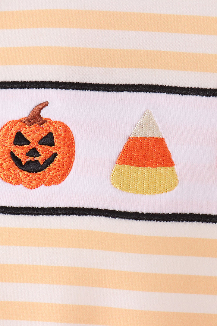 Embroidered pumpkin and candy corn patches on striped romper