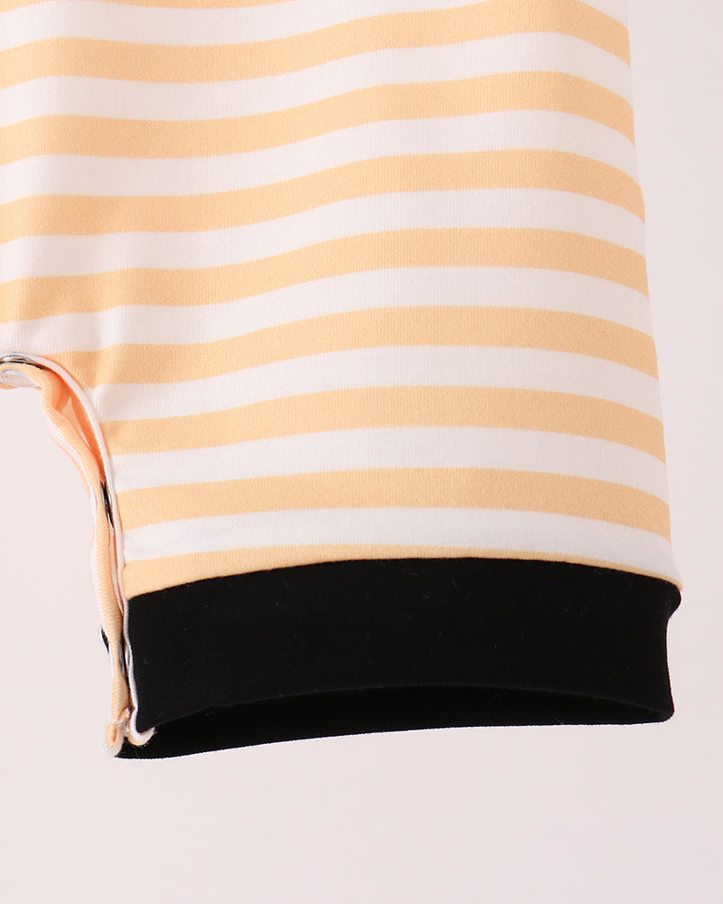 Striped romper leg hem with black bottom band