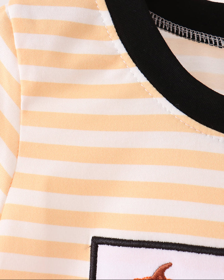 Orange and white striped top with black crew neckline and stitched pumpkin panel