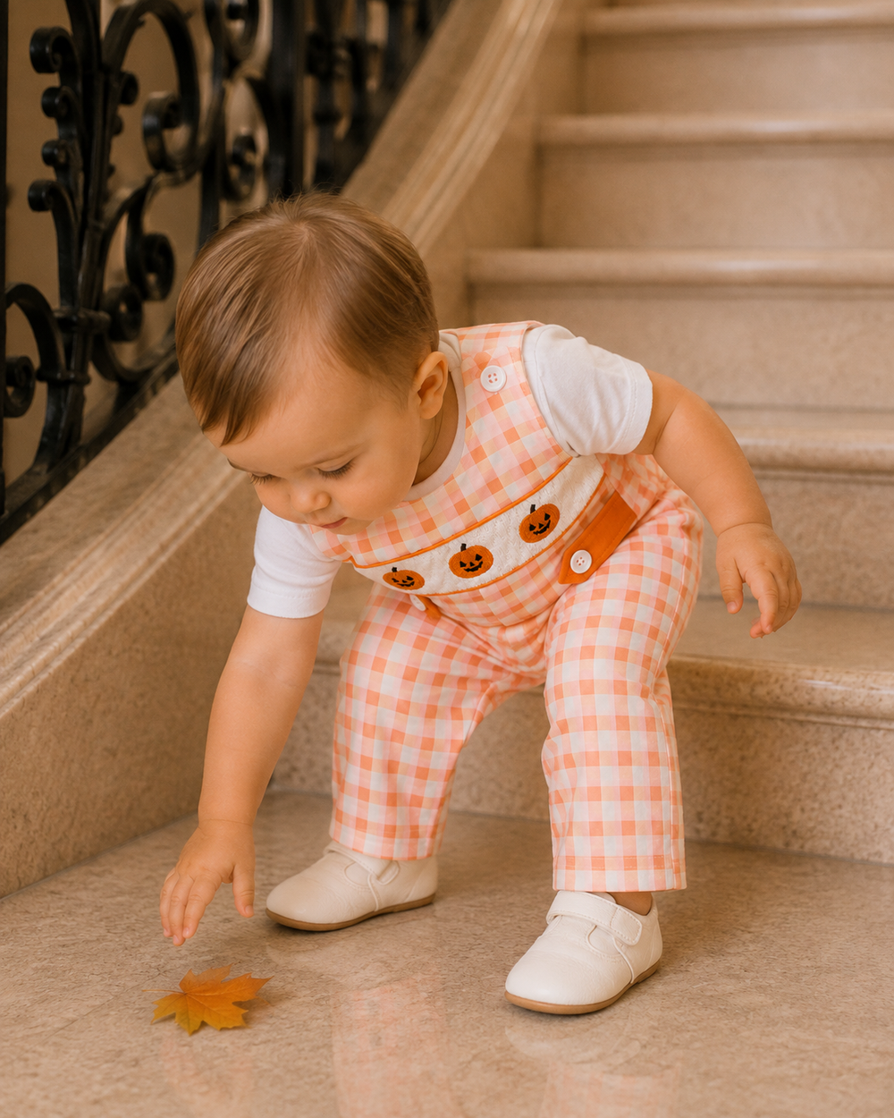 Orange gingham plaid jon jon with pumpkin face appliques and snap buttons
