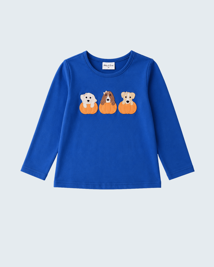 Blue long-sleeve top with embroidered pumpkin dogs across the chest