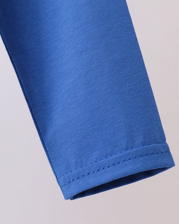 Blue long-sleeve top with stitched hem and cuff edge detail