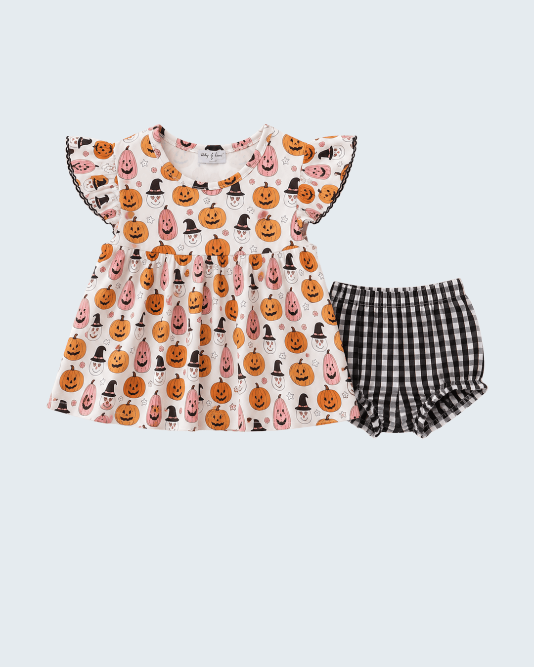 Pumpkin ruffle bloomer set flat lay, pink pumpkin print top with matching gingham bloomers