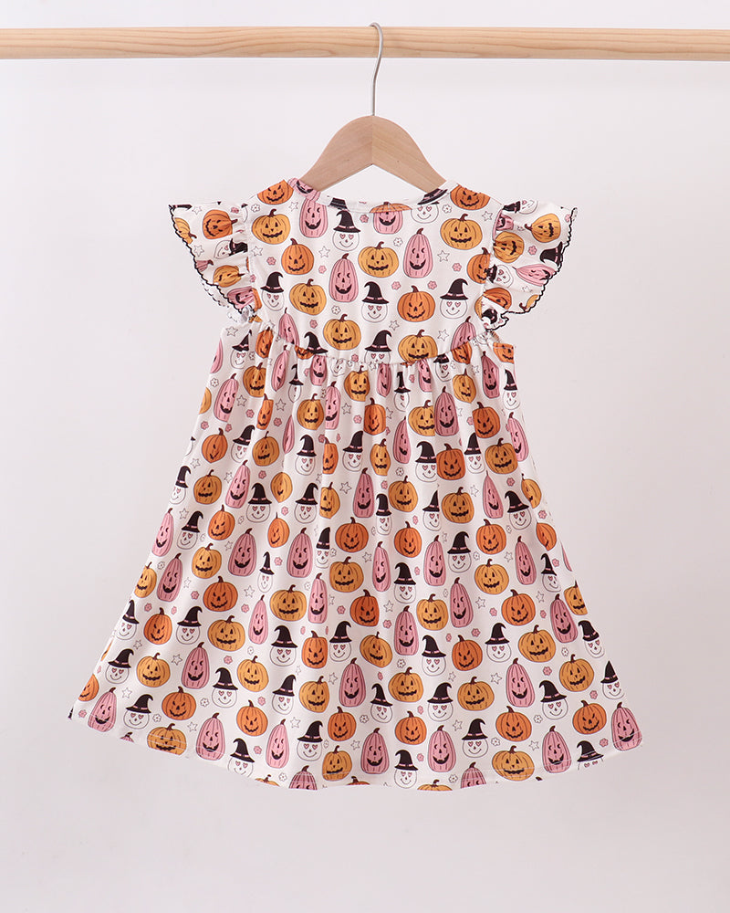 White pumpkin ruffle dress with flutter sleeves and all-over Halloween character print